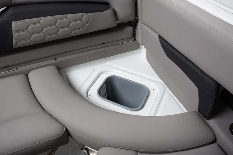 Slide: The Image of 2026 Four Winns HD8 OB boat interior with gray seating and built-in storage compartment. - 21