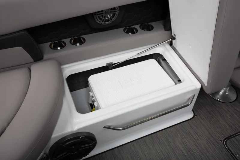 Slide: The Image of 2026 Four Winns HD8 OB boat interior with built-in cooler storage compartment. - 22