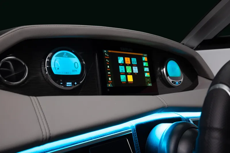 Slide: The Image of 2026 Four Winns HD8 OB dashboard with digital displays and illuminated controls. - 28
