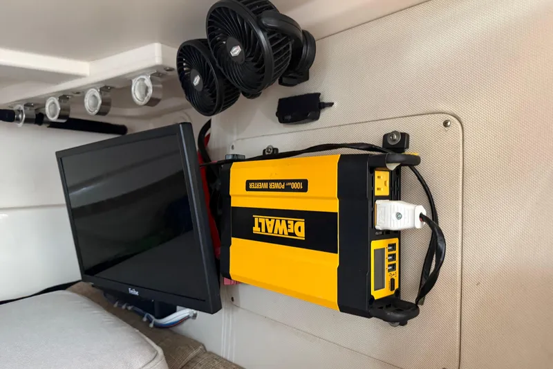 Slide: The Image of Interior of 2007 Grady-White Express 305 boat with cozy seating and modern amenities. - 24