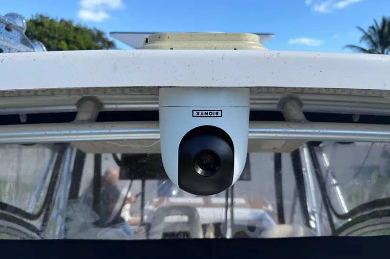 Slide: The Image of 2007 Grady-White Express 305 boat with Garmin radar, parked in a residential area. - 29