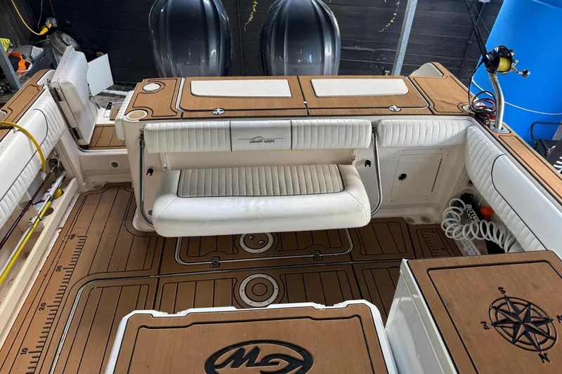 Slide: The Image of 2007 Grady-White Express 305 boat with twin Yamaha 300 V6 engines. - 3