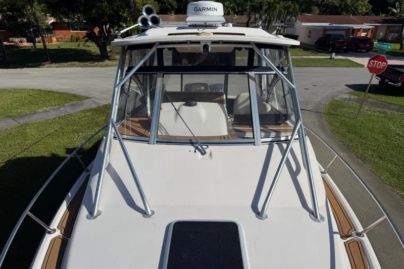 Slide: The Image of 2007 Grady-White Express 305 boat deck with registration number FL-7681-T. - 31