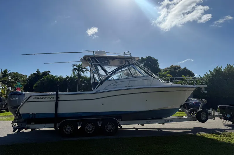 Slide: The Image of Yamaha 300 V6 4.2L outboard engines on a 2007 Grady-White Express 305 boat. - 36