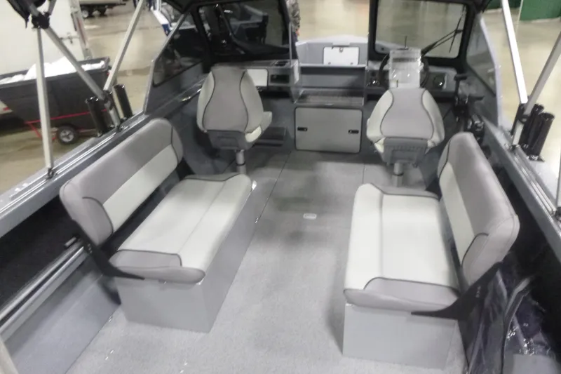 Slide: The Image of Interior of 2026 KingFisher 2025 Falcon boat with seating and steering console. - 14