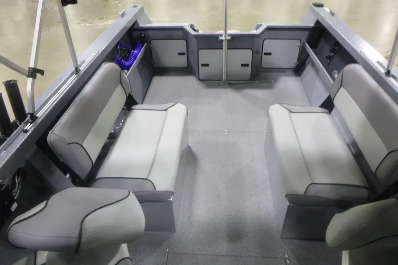 Slide: The Image of Interior of 2026 KingFisher 2025 Falcon boat with gray seating and spacious layout. - 15