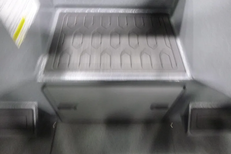 Slide: The Image of Interior view of KingFisher 2025 Falcon, featuring a textured floor mat, 2026 model. - 18