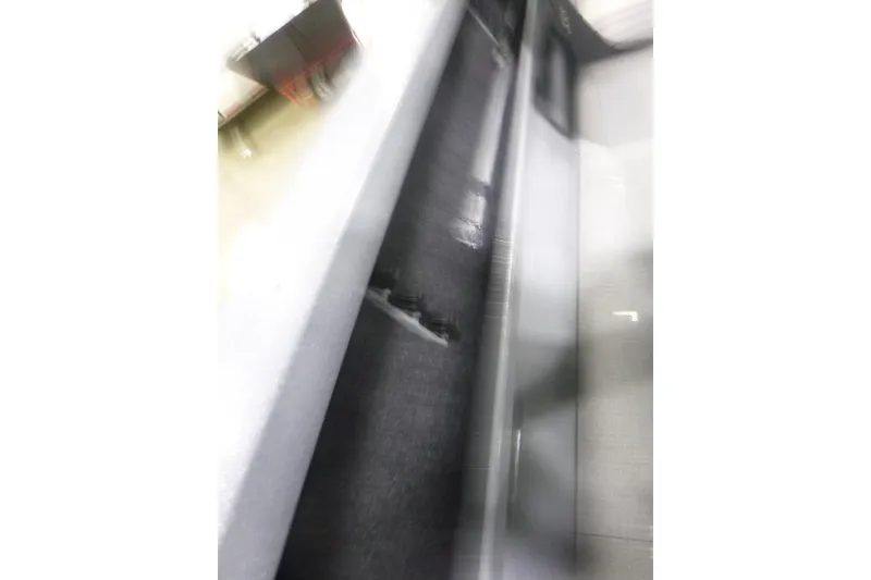 Slide: The Image of Blurred interior view of KingFisher 2025 Falcon boat, showcasing sleek design elements. - 27