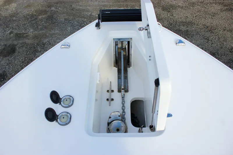 Slide: The Image of 2018 Sea Hunt Gamefish 30 anchor locker with chain and storage compartments. - 10