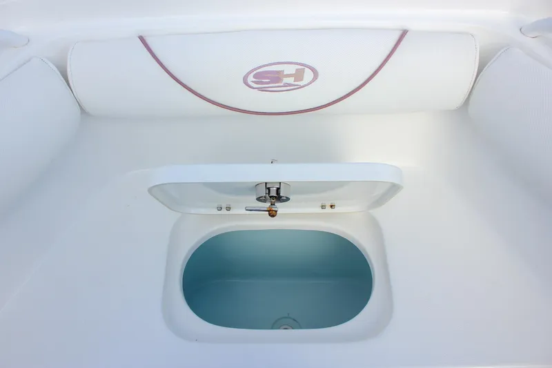 Slide: The Image of 2018 Sea Hunt Gamefish 30 livewell with open lid, showcasing interior. - 13