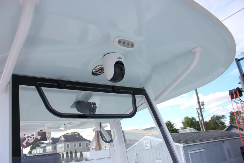 Slide: The Image of 2018 Sea Hunt Gamefish 30 boat with mounted security camera on the canopy. - 18