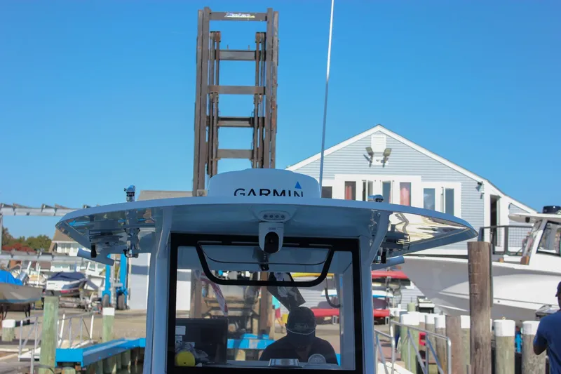 Slide: The Image of 2018 Sea Hunt Gamefish 30 boat at marina with Garmin equipment. - 29