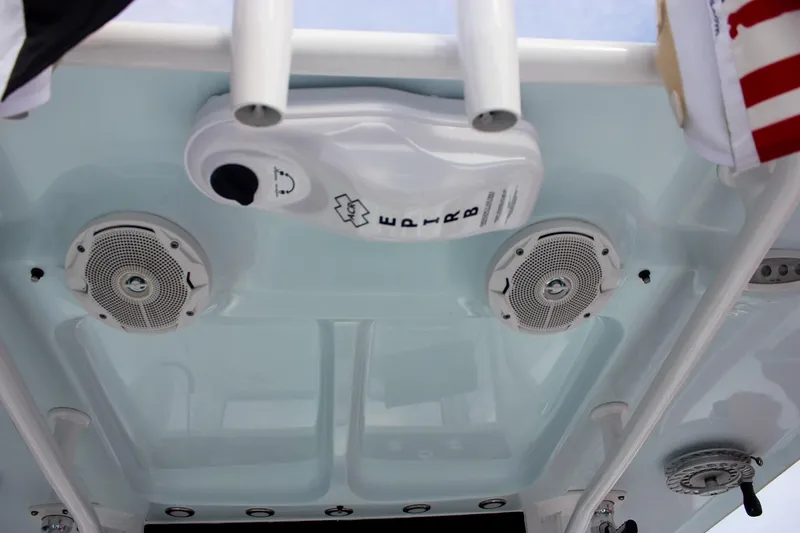 Slide: The Image of 2018 Sea Hunt Gamefish 30 boat ceiling with speakers and EPIRB device. - 30