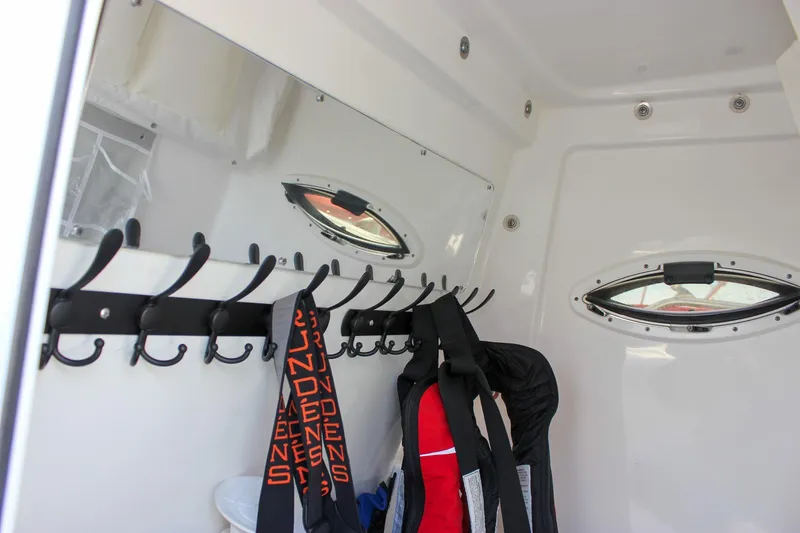 Slide: The Image of Interior of 2018 Sea Hunt Gamefish 30 with hooks and life jackets. - 57