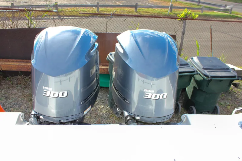 Slide: The Image of Twin Yamaha 300 outboard engines on a 2018 Sea Hunt Gamefish 30 boat. - 59