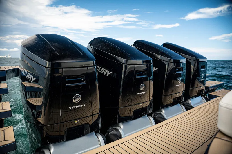 Slide: The Image of Luxurious Dutch American DA 53 yacht interior with ocean view, featuring elegant seating and tables, 2025 model. - 20