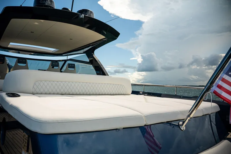 Slide: The Image of Luxury Dutch American DA 53 boat with Mercury Verado engines on open water, 2025 model. - 25