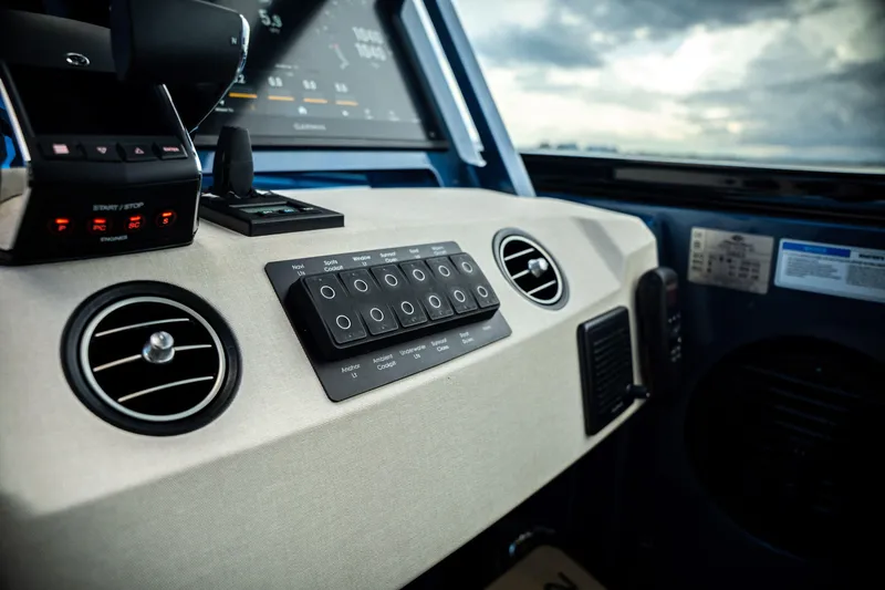 Slide: The Image of Luxurious Dutch American DA 53 yacht cruising on serene waters at sunset, 2025 model. - 43