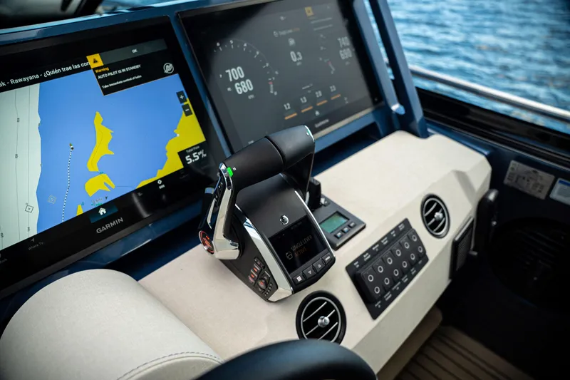 Slide: The Image of Luxurious 2025 Dutch American DA 53 yacht interior with elegant white seating and modern design. - 63