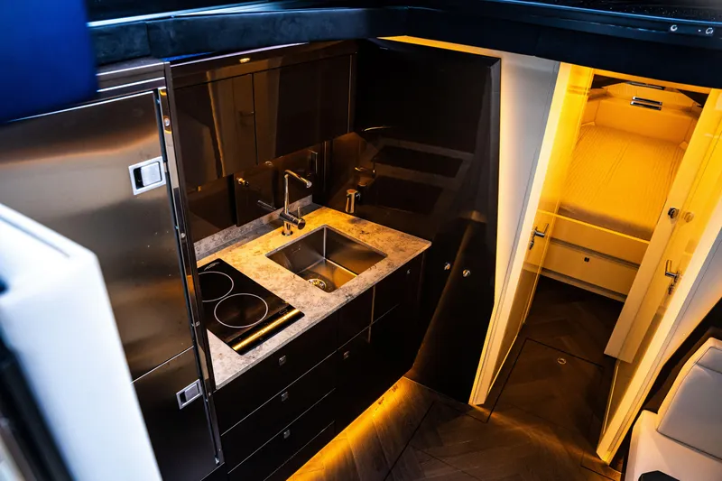 Slide: The Image of Luxurious 2025 Dutch American DA 53 yacht with sleek design on calm ocean waters. - 70