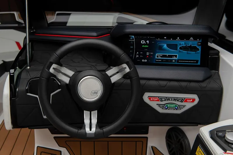 Slide: The Image of Manufacturer Provided Image: 2024 Nautique Super Air Nautique GS22 dashboard with touchscreen and steering wheel. - 20
