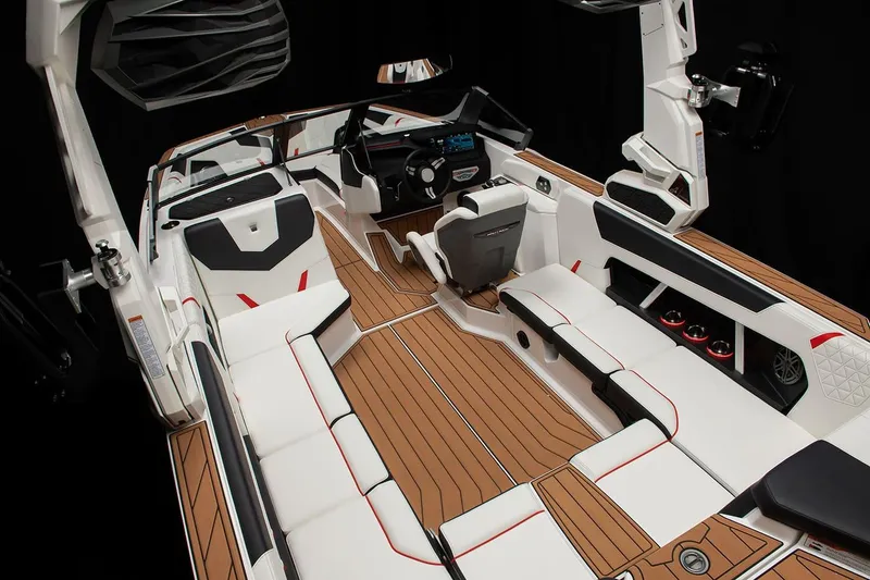 Slide: The Image of Manufacturer Provided Image: 2024 Nautique Super Air Nautique GS22 interior with luxurious seating and advanced dashboard. - 24