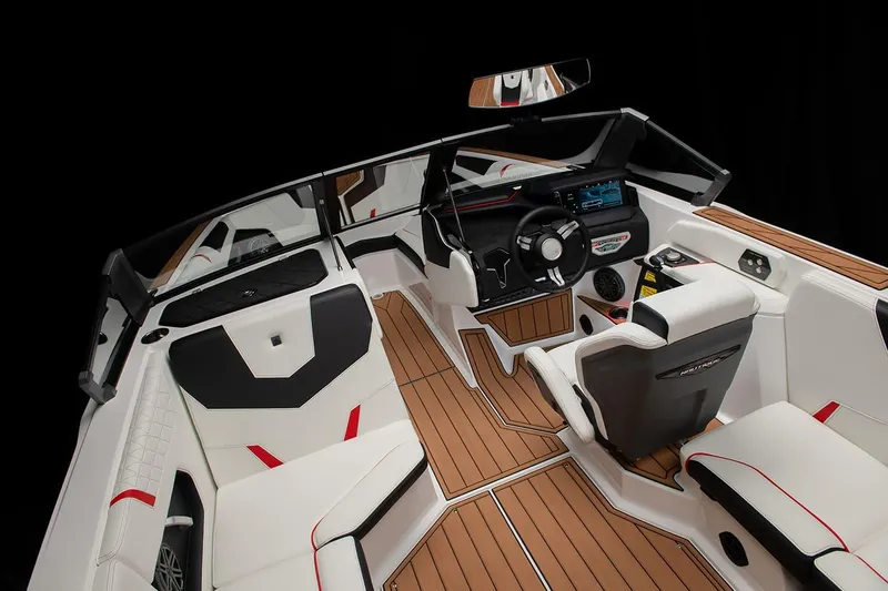 Slide: The Image of Manufacturer Provided Image: 2024 Nautique Super Air Nautique GS22 interior with modern dashboard and luxurious seating. - 25