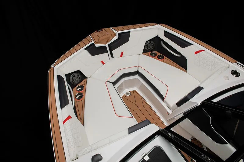 Slide: The Image of Manufacturer Provided Image: 2024 Nautique Super Air Nautique GS22 boat interior with white and tan seating. - 27
