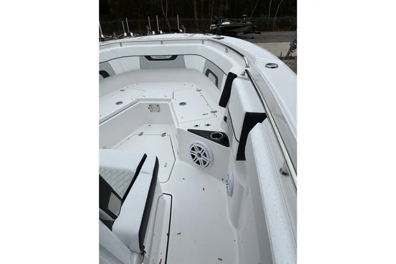 Slide: The Image of 2026 Blackfin 272 CC boat interior with seating and speaker system. - 16