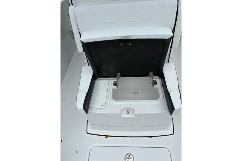 Slide: The Image of 2026 Blackfin 272 CC boat seat with open storage compartment. - 21
