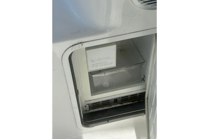 Slide: The Image of Open refrigerator on 2001 Sea Ray 400 Sedan Bridge yacht. - 13
