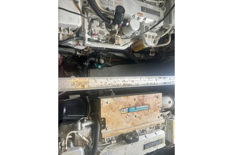 Slide: The Image of Engine room of 2001 Sea Ray 400 Sedan Bridge with Caterpillar marine engines. - 54