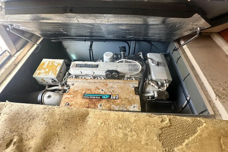 Slide: The Image of Engine compartment of a 2001 Sea Ray 400 Sedan Bridge boat. - 58