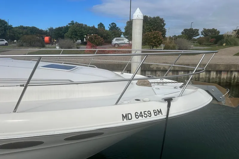 Slide: The Image of 2001 Sea Ray 400 Sedan Bridge docked, showcasing sleek design and registration number MD 6459 BM. - 7