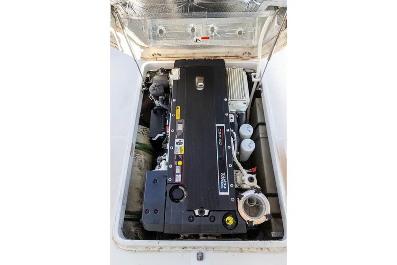 Slide: The Image of Engine compartment of 2007 Hunt Surfhunter 29 with Volvo Penta D6-350 engine. - 49