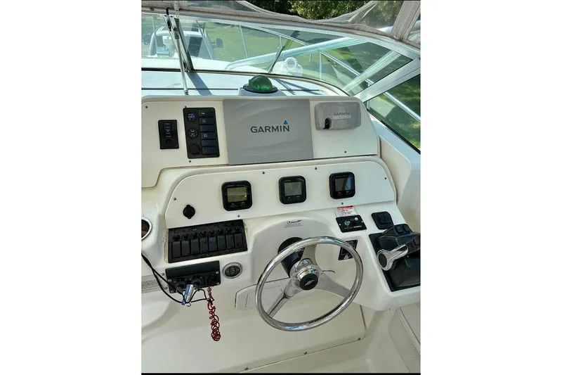 Slide: The Image of Helm of 2000 Wellcraft 290 Coastal boat with Garmin navigation system. - 3