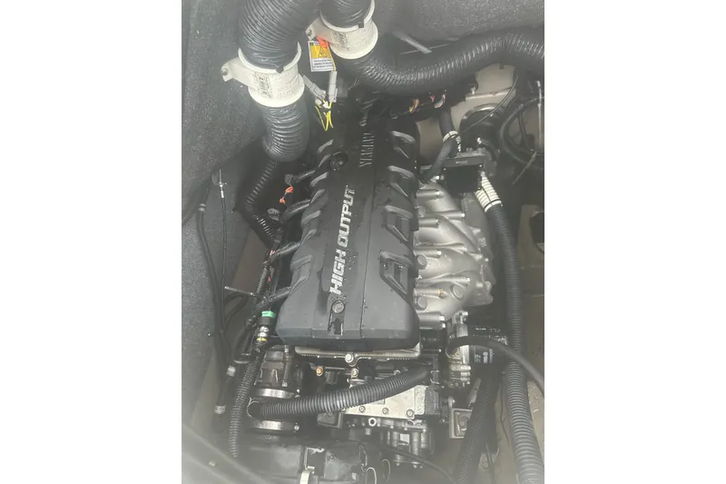 Slide: The Image of 2015 Yamaha Boats 242 Limited engine compartment with high output engine components. - 24
