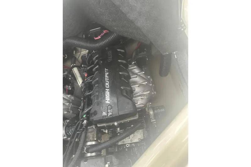 Slide: The Image of 2015 Yamaha Boats 242 Limited engine compartment with high output engine. - 26