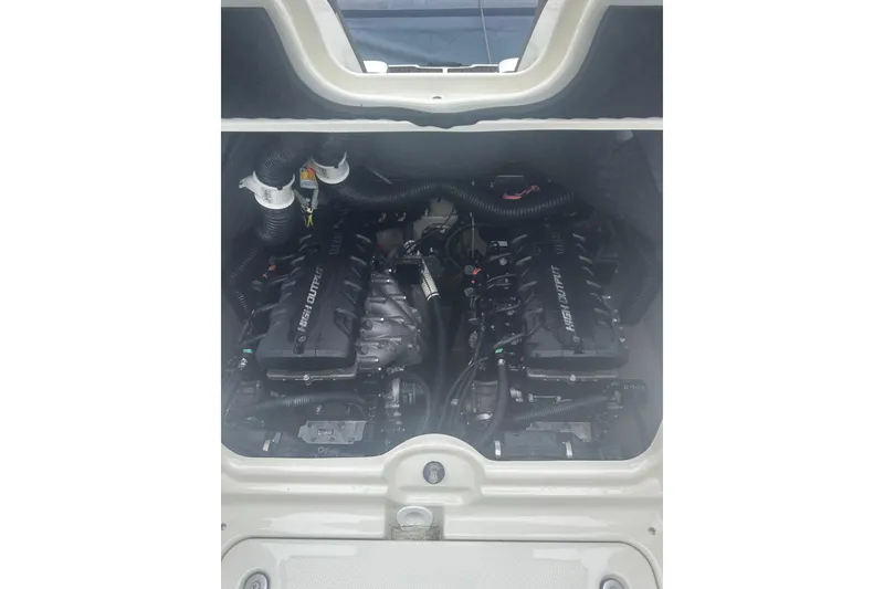 Slide: The Image of 2015 Yamaha Boats 242 Limited engine compartment with twin high-output engines. - 28