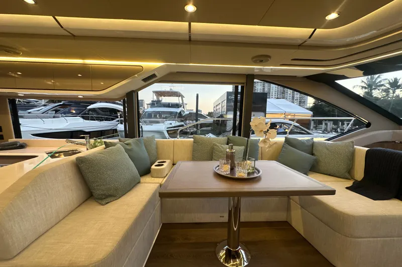 Slide: The Image of Luxurious interior of 2026 Cruisers Yachts 57 Fly with elegant seating and decor. - 16