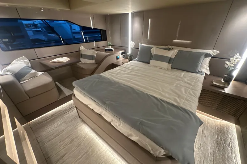 Slide: The Image of Luxurious bedroom interior of 2026 Cruisers Yachts 57 Fly with modern design and elegant decor. - 34