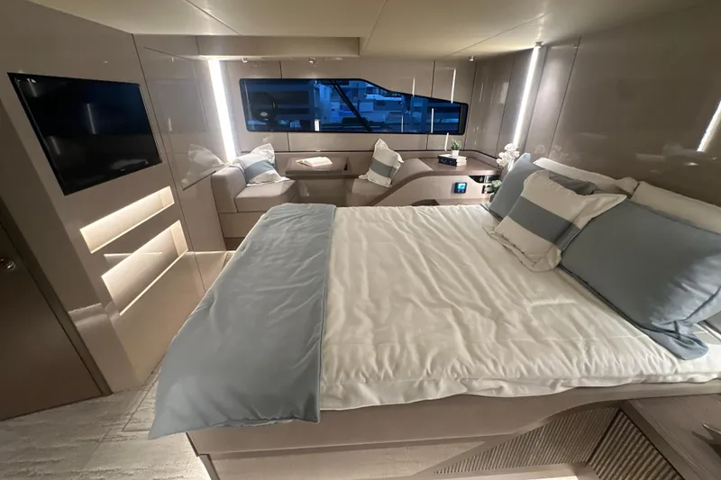 Slide: The Image of Luxurious interior of 2026 Cruisers Yachts 57 Fly, featuring a cozy bedroom and modern amenities. - 35