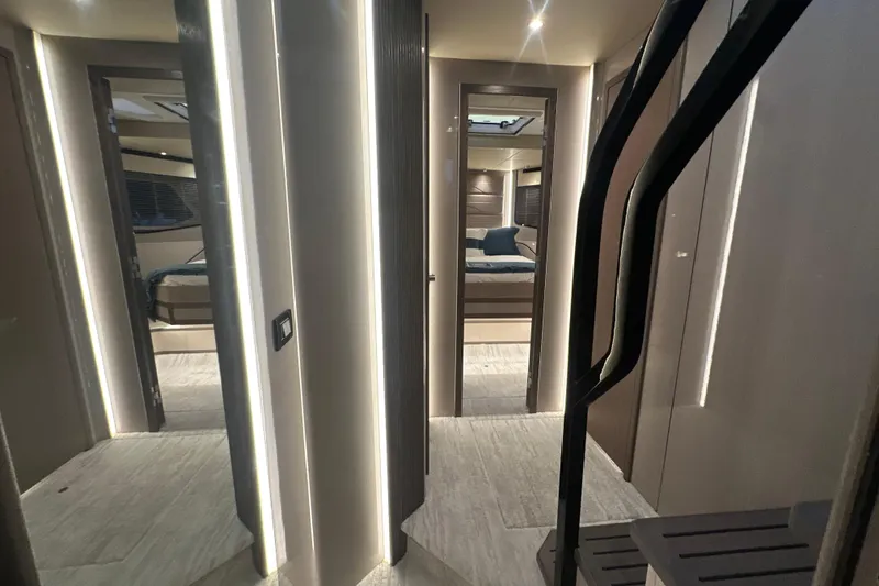 Slide: The Image of Luxurious interior of 2026 Cruisers Yachts 57 Fly, featuring modern design and ambient lighting. - 41