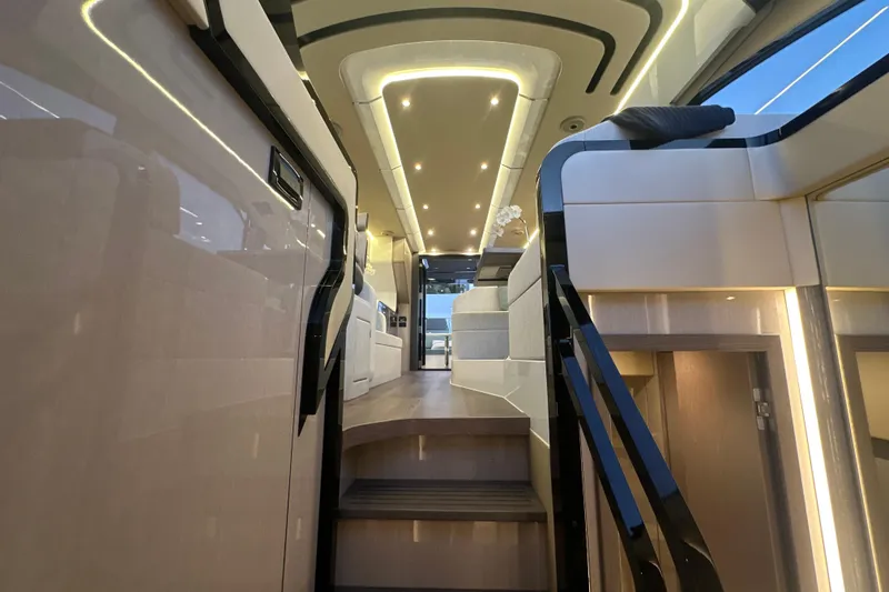 Slide: The Image of Luxurious interior of 2026 Cruisers Yachts 57 Fly, featuring modern lighting and elegant design. - 42