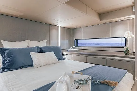 Slide: The Image of Luxurious interior of 2026 Cruisers Yachts 57 Fly, featuring modern design and elegant furnishings. - 9