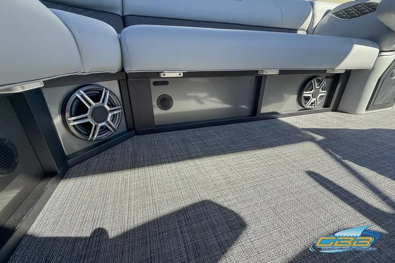 Slide: The Image of 2026 JC 25 Neptoon LG boat interior with speakers and cushioned seating. - 30