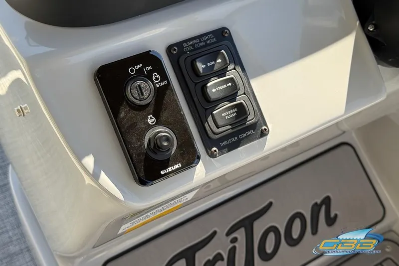 Slide: The Image of Control panel of 2026 JC 25 Neptoon LG boat with Suzuki ignition and thruster controls. - 34