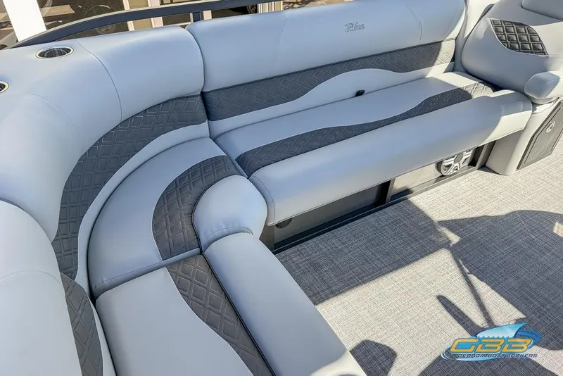 Slide: The Image of Luxurious seating on 2026 JC 25 Neptoon LG pontoon boat, featuring elegant gray upholstery. - 36