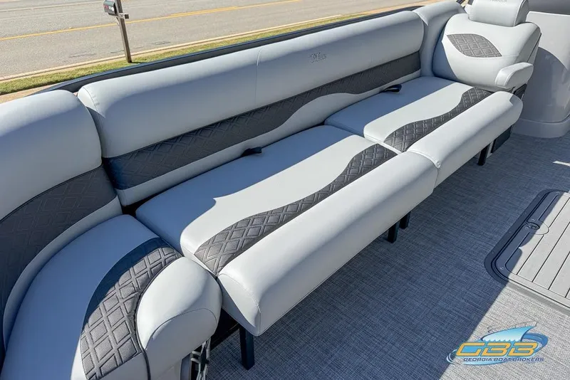 Slide: The Image of Luxurious seating on 2026 JC 25 Neptoon LG pontoon boat, featuring elegant gray upholstery. - 37
