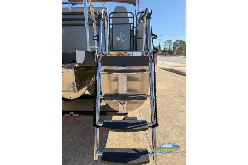 Slide: The Image of 2026 JC 25 Neptoon LG boat ladder, rear view, outdoor setting. - 44